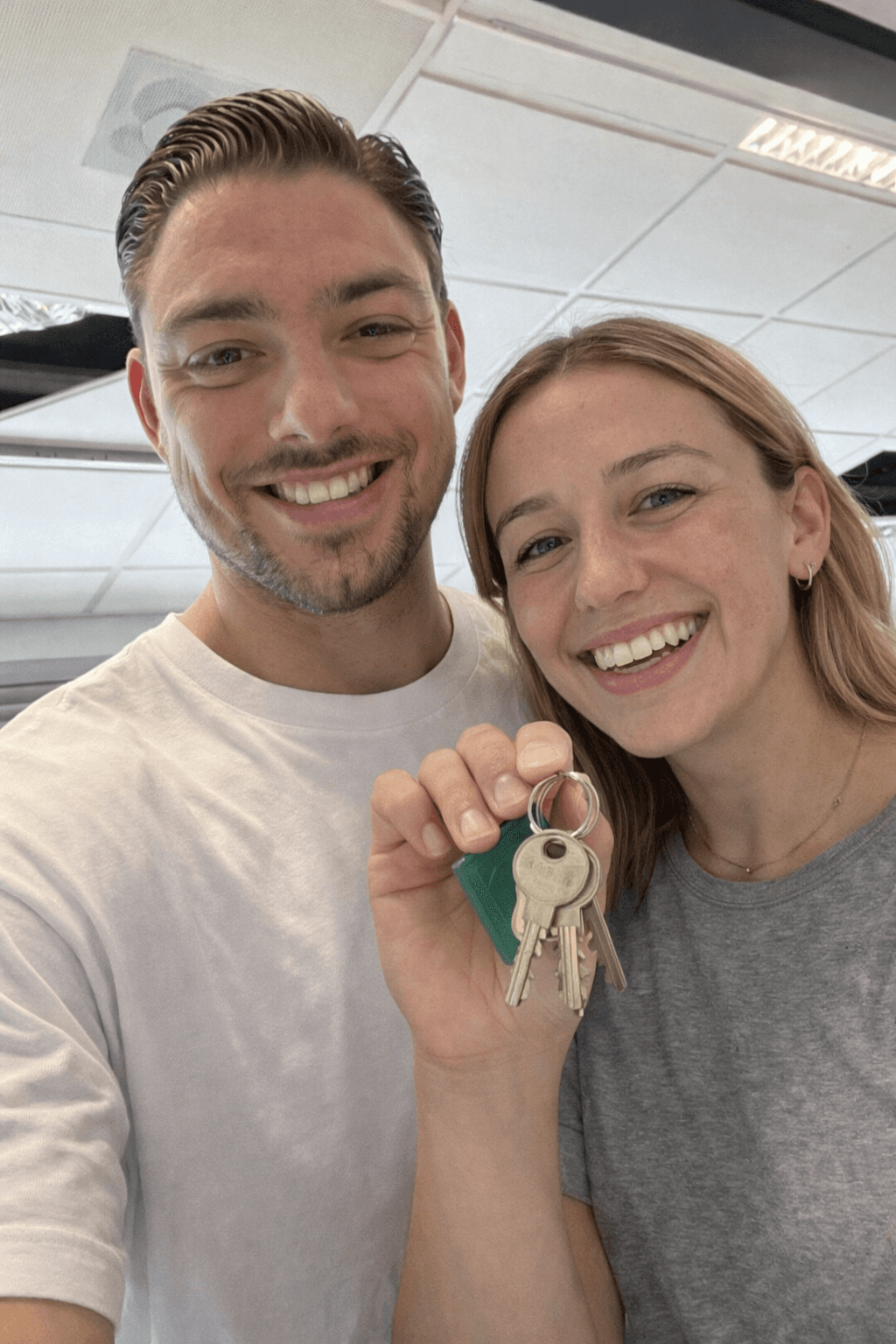Lisa & Mark with the keys to their home in Amsterdam
